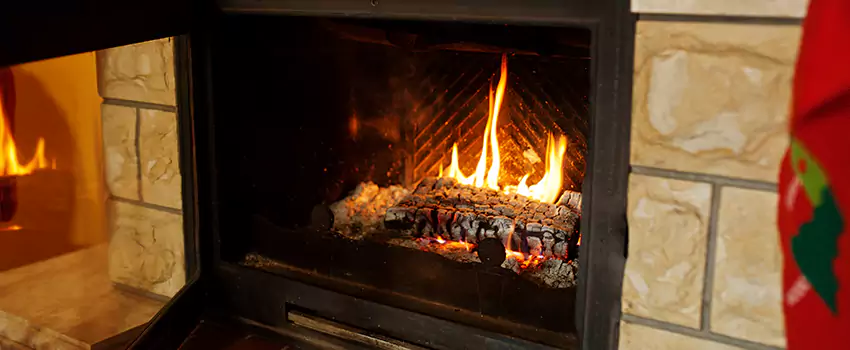 Commercial Prefabricated Fireplace Replacement in Blainville, Quebec